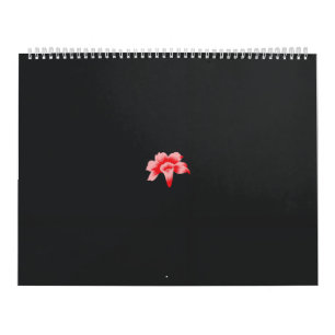 Calendrier une fleur rouge sur un arrière - plan noir
