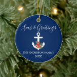Calligraphy Seas and Greetings Poinsettia Anchor Keramik Ornament<br><div class="desc">Stylish Calligraphy Script Nautical Seas & Greetings Navy Blue Ornament. Anchor topped with Watercolor Floral including red poinsettias,  pine cones and other beautiful winter greenery.</div>