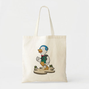 Canard comme randonneur avec sac à dos