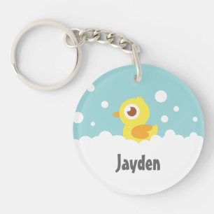 Canard en caoutchouc mignon dans un bain moussant