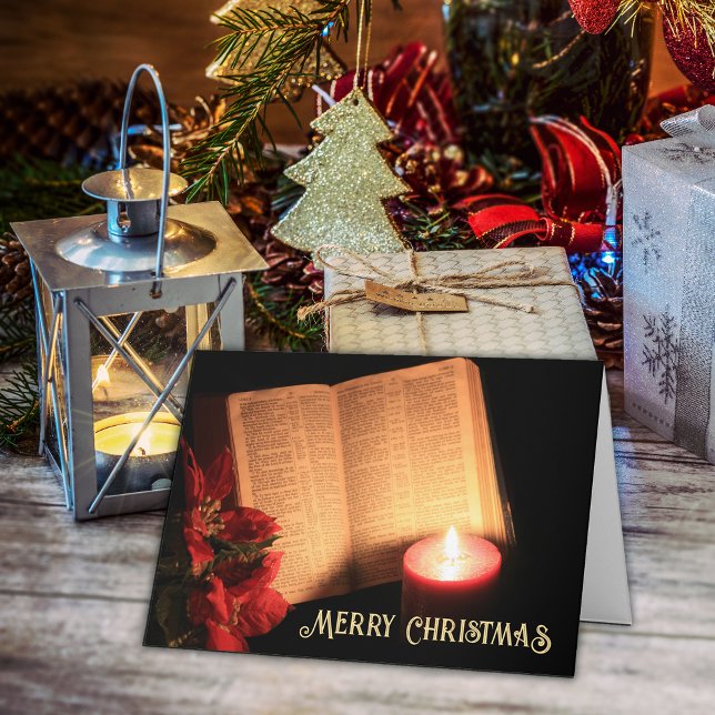 Candle Poinsettia Alte Bibel Feiertagskarte (Merry Christmas greeting card with Bible, poinsettia and votive candle.)
