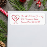 Candy Cane Heart Monogram Christmas Rücksendeadres<br><div class="desc">Fügen Sie Ihrer Urlaubspost eine Touch feierlichen Charmes mit diesem edlen, trendigen, trendigen Herzenlabel hinzu! Dieses Label mit einem süßen, rot-weißen Zuckerrohr-Design, das in ein Herz mit individualisierbarem Familiennamen und Adresstext geformt wurde, ist ideal für die Verleihung von Feiertagssjubeln. Ob Weihnachtskarten, Einladungen oder saisonale Grüße, dieses Label fügt Ihren Kuverts...</div>