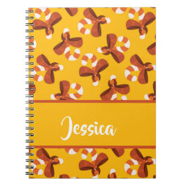 Candy cane wrapped with red bow pattern notizblock