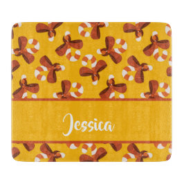 Candy cane wrapped with red bow pattern schneidebrett