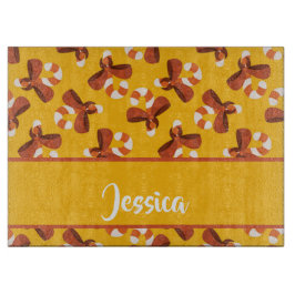 Candy cane wrapped with red bow pattern schneidebrett