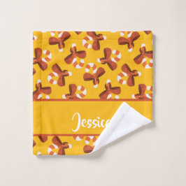 Candy cane wrapped with red bow pattern waschlappen