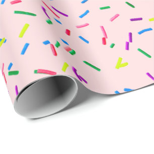 Candy Sprinkles auf rosa Geschenkpapier