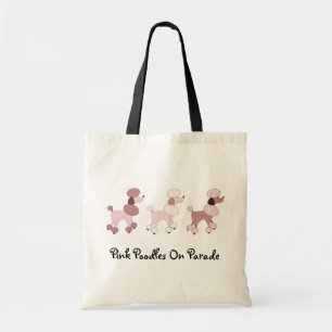 Caniches roses sur le sac de défilé