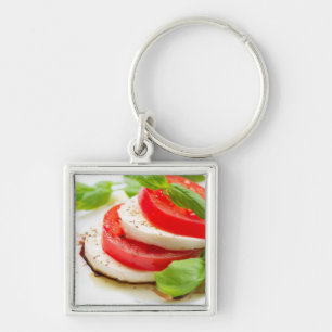 Caprese Salat. Tomate- und Mozzarellascheiben Schlüsselanhänger