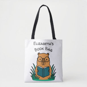 Capybara beim Lesen eines Buches Tasche