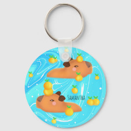 Capybaras in Wasser mit Orangen Schlüsselanhänger