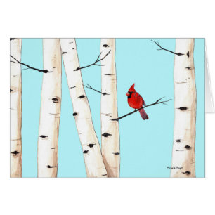 Cardinal avec des arbres de bouleau