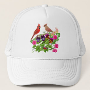 Cardinaux dans le casquette de maille de jardin