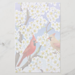 Cardinaux en papeterie d'arbre fleurissant