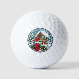 Cardinaux et balles de golf pour mangeoire de Noël