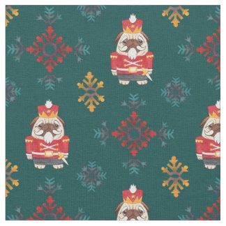 Carlin rouge de casse-noix sur le tissu vert