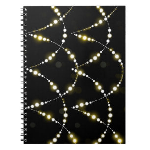 Carnet Chaîne de lumières brillantes sur noir