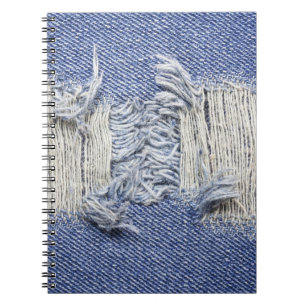 Carnet Dénim bleu déchiré : texture de jeans.