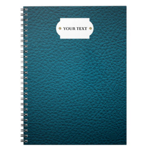 Carnet en cuir bleu.