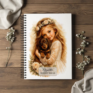 Carnet Fille serrant un chiot teckel dans ses bras
