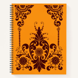 Carnet fleurs orange et impression de volutes