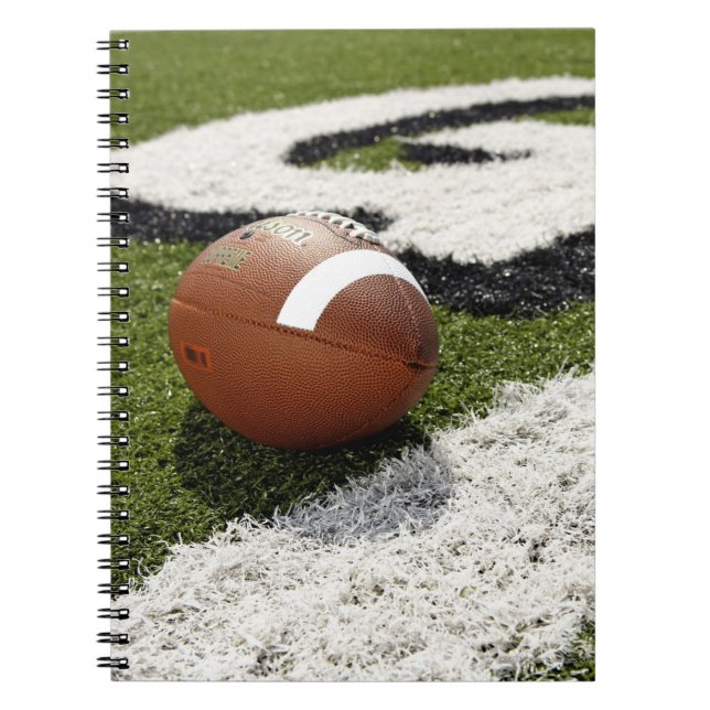 Carnet Football en ligne de but sur le terrain de footbal (Devant)