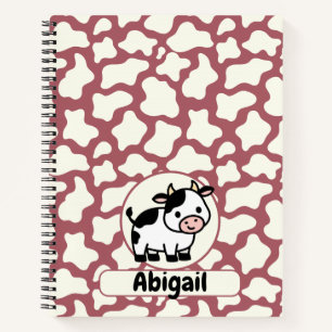 Carnet Motif de vache en blanc sur fond rouge avec vache