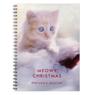 Carnet Petit Kitten reposant sur un chapeau de Noël Meowy