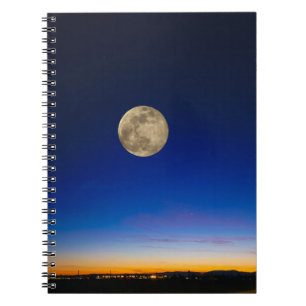 Carnet Pleine lune qui monte au-dessus du coucher du sole