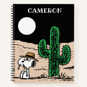 Carnet Spike dans un désert illuminé par la Lune