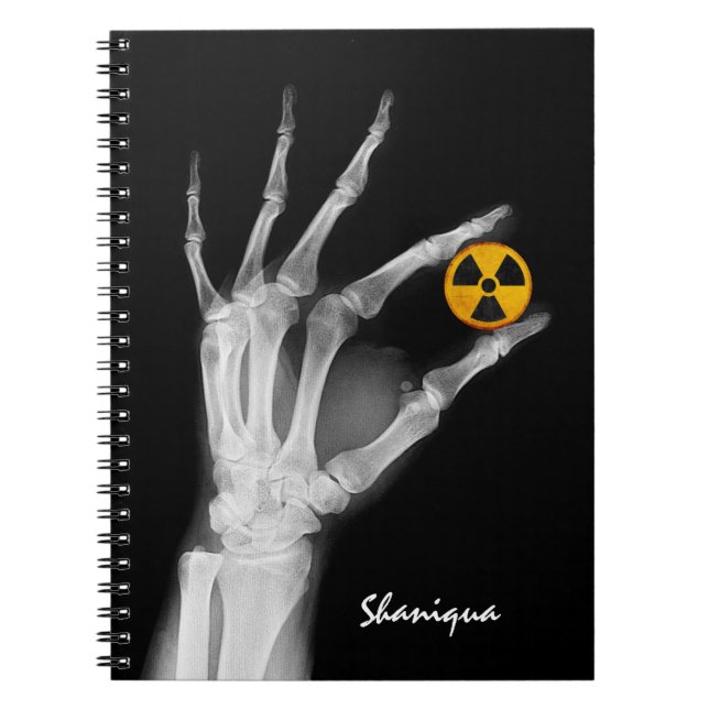 Carnet Tenir à la main un symbole de rayonnement (Devant)