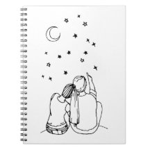 Un couple amoureux s'assied et compte les étoiles 