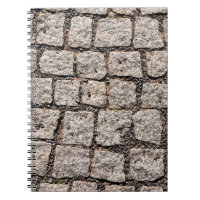 Vieux motif en pierre de caillou dans la rue abstr