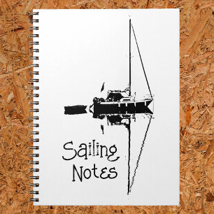 Carnet Voilier avec son reflet sur une mer calme
