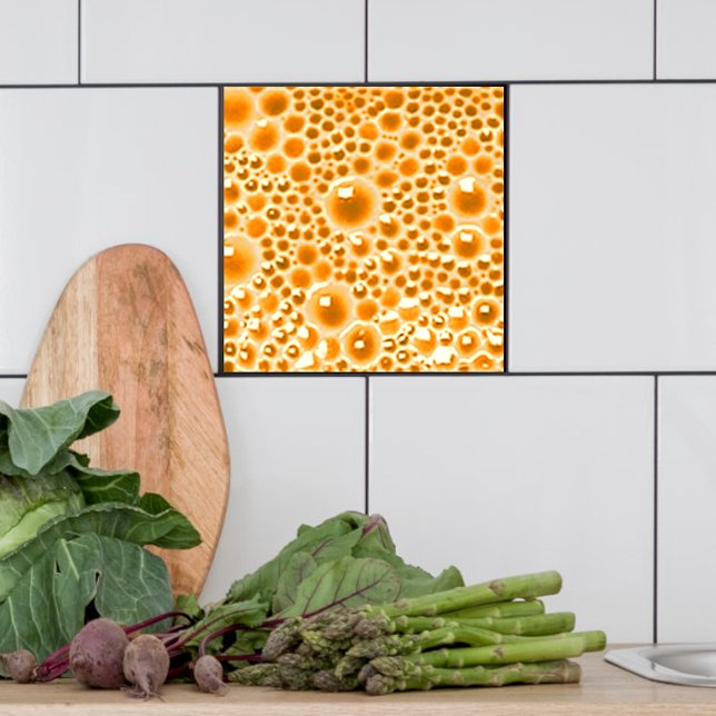 Carreau Carrelage décoratif avec bulles, marmelade d'orang (Orange marmalade bubble tile shown  in a kitchen.)