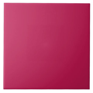 Carreau Carrelage en céramique rouge framboise foncé.