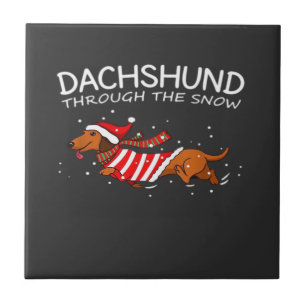 Carreau Dachshund à travers la neige Drôle de chien Noël C