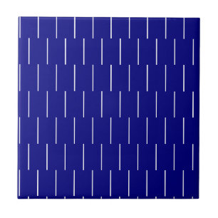 Carreau de céramique bleu et blanc à pois