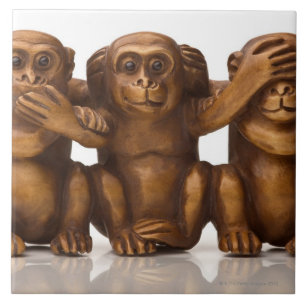 Carreau Découpage de trois singes en bois