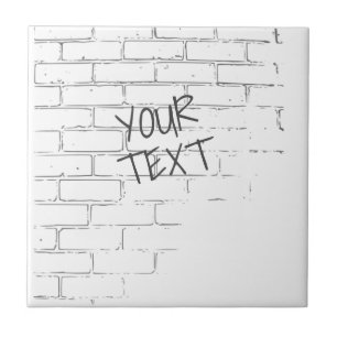 CARREAU DO-IT-YOURSELF MUR DE BRIQUE BLANC AVEC GRAFFITI.