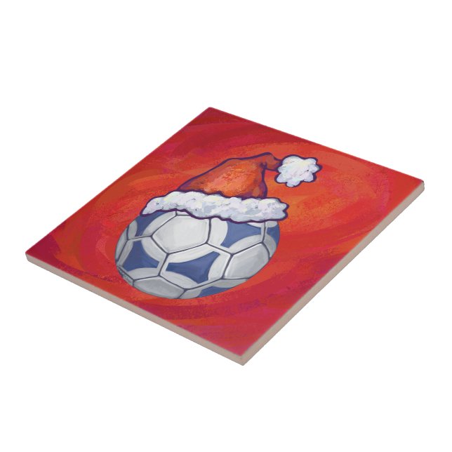 Carreau En Céramique Bal de soccer bleu et blanc sur rouge (Côté)