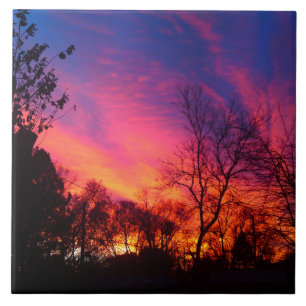 Carreau En Céramique Coucher du soleil ardent par les arbres
