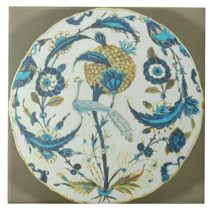 Carreau En Céramique Le plat d'Iznik peint avec un paon était perché