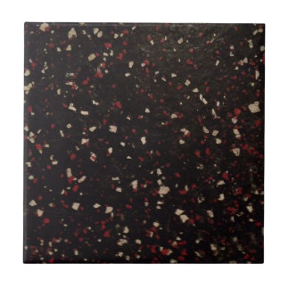 Carreau En Céramique motif tacheté noir et rouge et blanc