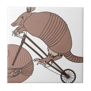 Carreau En Céramique Vélo d'équitation de tatou avec la roue de tatou