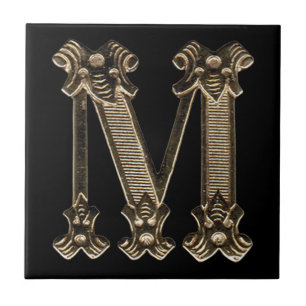 Carreau Initiale ou monogramme d'or de la lettre M sur le