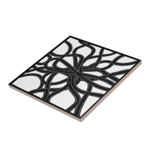 Carreau Motif symétrique courbe noir sur blanc attaché par