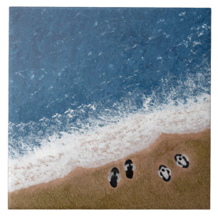 Carreau Tongs sur le sable de la plage