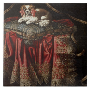 Carreau Un épagneul posé sur un coussin brodé
