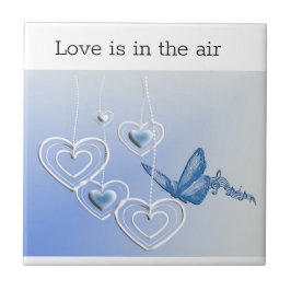 Carreau Un papillon et des coeurs
